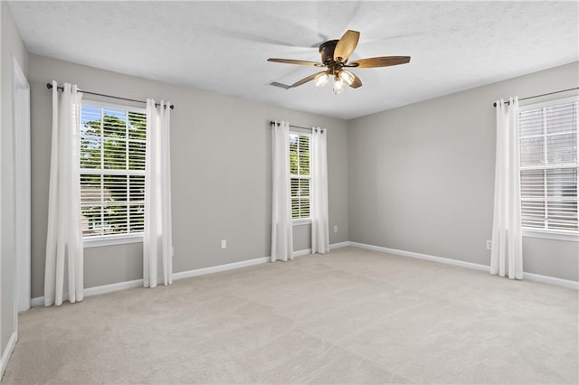 4044 Spring Cove Dr, Duluth, GA 30097 - empty room featuring carpet flooring, a ceiling fan, baseboards, and a textured ceiling