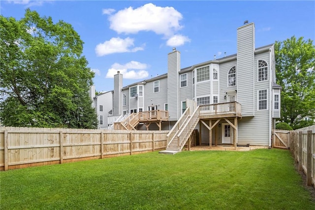 4044 Spring Cove Dr, Duluth, GA 30097 - rear view of house with stairs, a deck, and a chimney