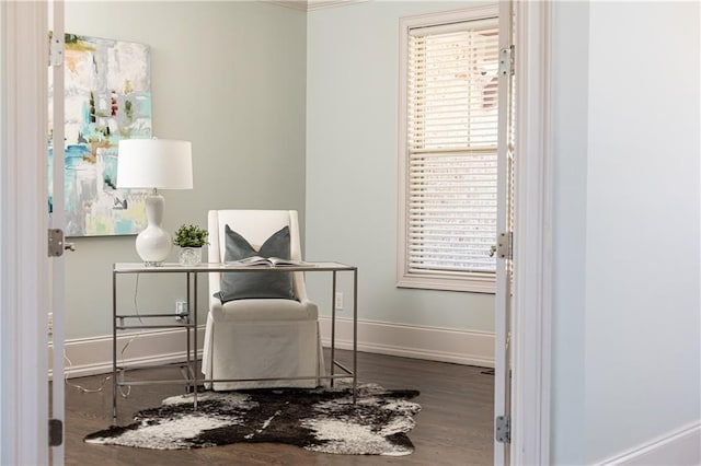 office space with dark hardwood / wood-style flooring and crown molding