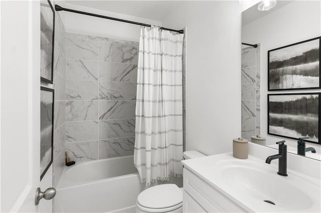 full bathroom featuring vanity, toilet, and shower / bath combo