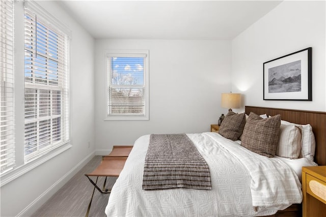 bedroom with multiple windows