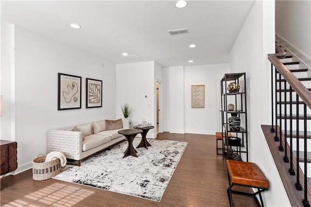 living room featuring dark hardwood / wood-style floors