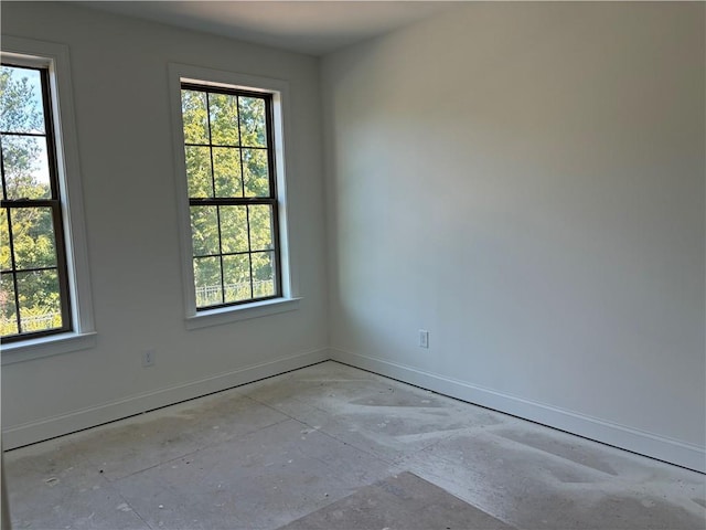 spare room featuring plenty of natural light