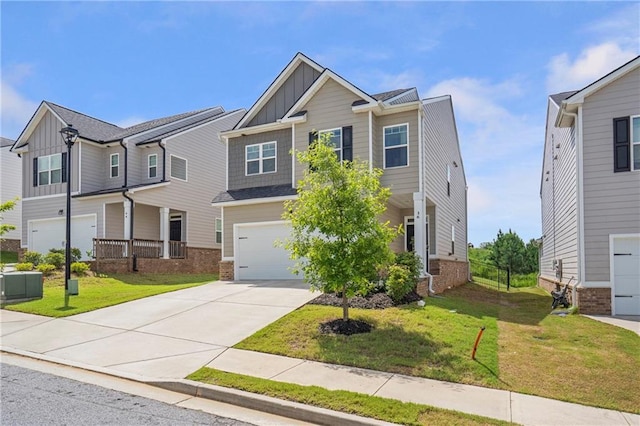 36 Mead Ct, Hoschton, GA 30548 - craftsman inspired home with board and batten siding, concrete driveway, a garage, brick siding, and a front lawn