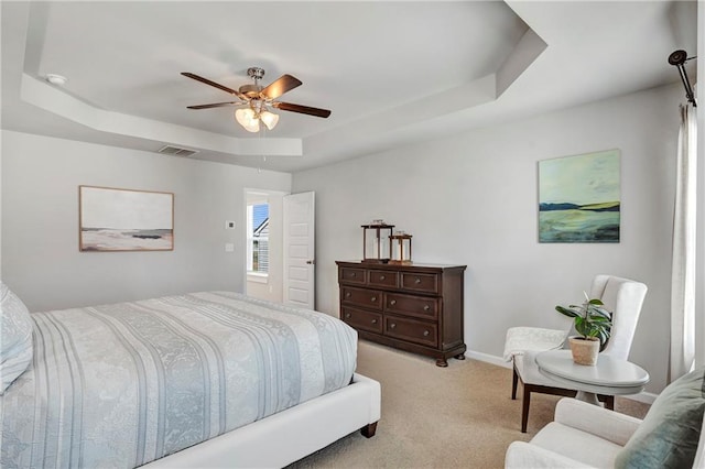 36 Mead Ct, Hoschton, GA 30548 - bedroom with a tray ceiling, light colored carpet, and ceiling fan