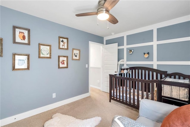 36 Mead Ct, Hoschton, GA 30548 - bedroom featuring carpet, a nursery area, and a ceiling fan