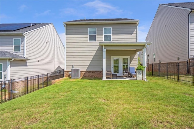 36 Mead Ct, Hoschton, GA 30548 - back of property featuring a patio and a fenced backyard