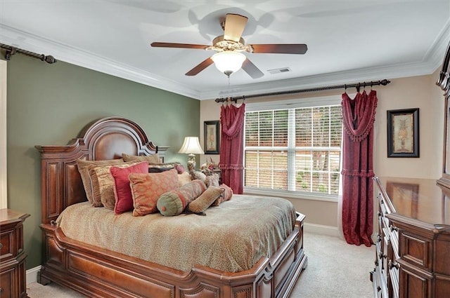 bedroom with light colored carpet, a ceiling fan, ornamental molding, visible vents, and baseboards