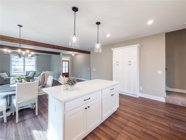 unfurnished bedroom with ceiling fan, light carpet, and ensuite bath