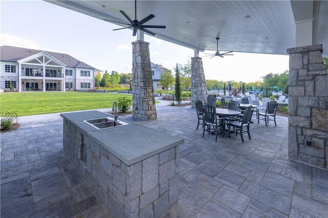 view of patio / terrace with ceiling fan