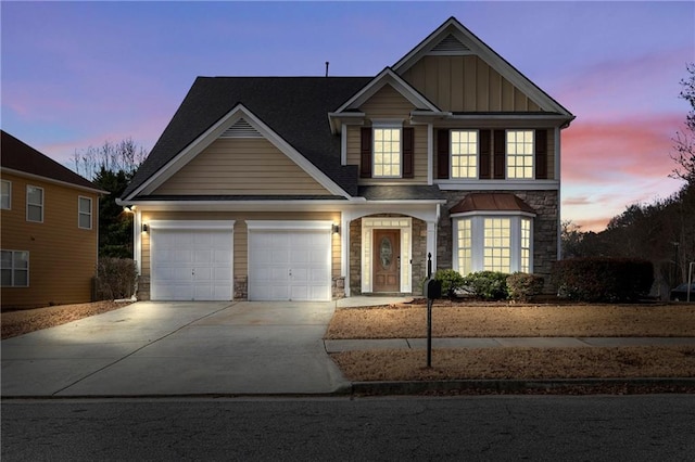 view of front of property featuring a garage