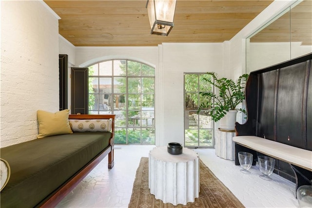 sitting room featuring wood ceiling