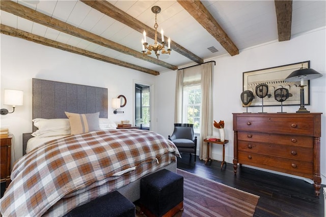 bedroom with an inviting chandelier, beamed ceiling, wood finished floors, and visible vents