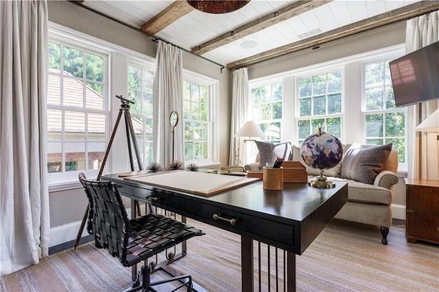 sunroom with beamed ceiling