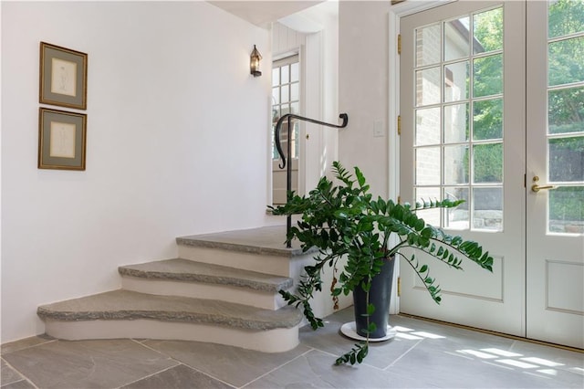 stairway with french doors