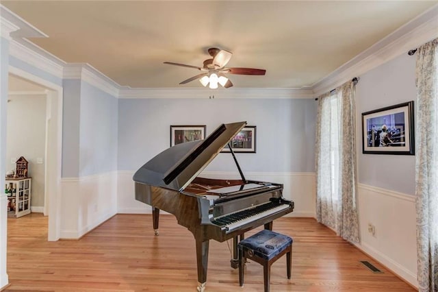 3000 The Springs Dr, Monroe, GA 30656 - living area with ceiling fan, light wood finished floors, and ornamental molding