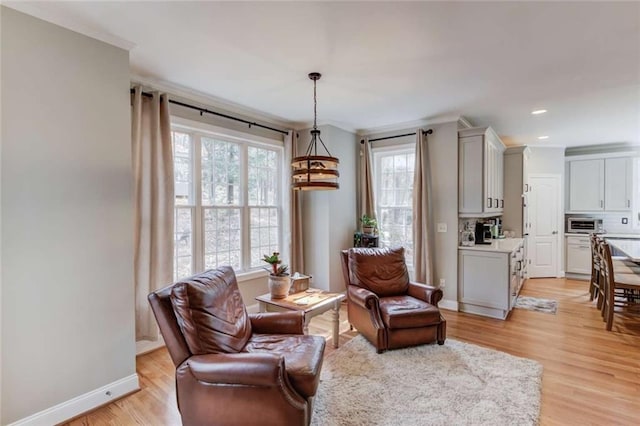3000 The Springs Dr, Monroe, GA 30656 - sitting room featuring plenty of natural light, light wood-style flooring, recessed lighting, and ornamental molding