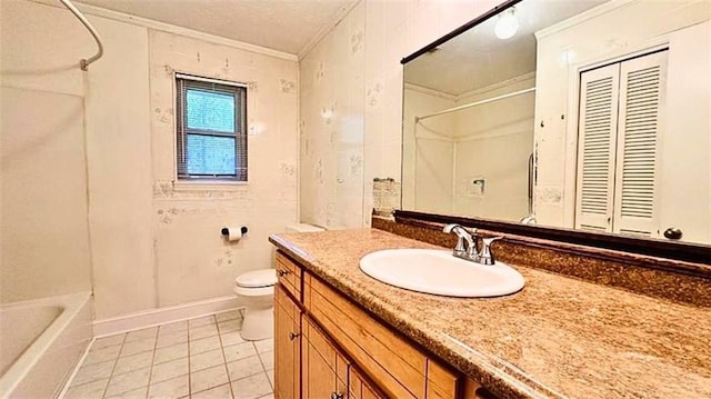 bathroom featuring toilet, ornamental molding, tile patterned flooring, bathing tub / shower combination, and vanity