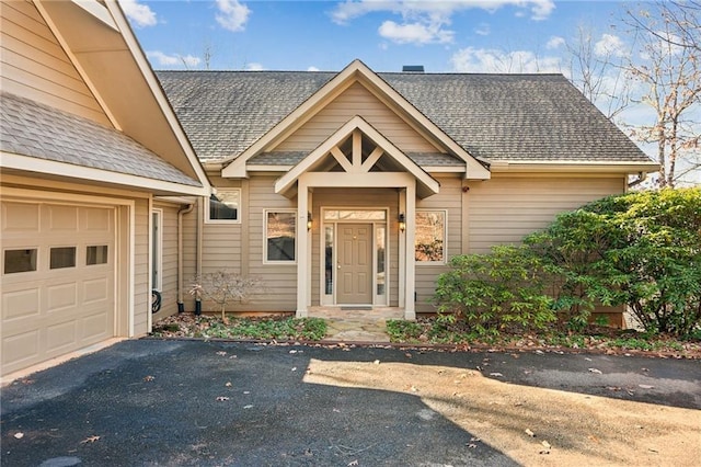 property entrance featuring a garage