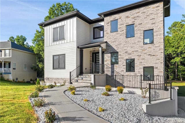 view of front of home with a front yard