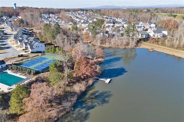 bird's eye view featuring a residential view and a water view