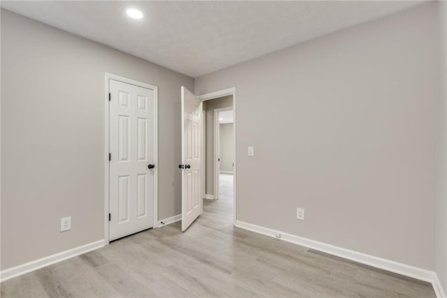 empty room featuring light hardwood / wood-style floors