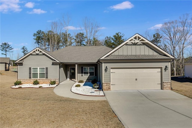 view of front of home with a front lawn and a garage