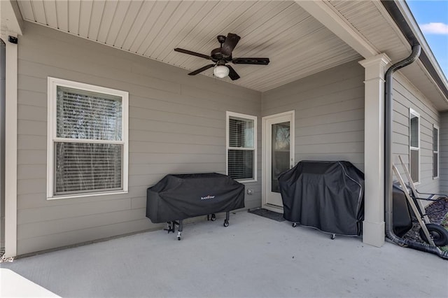 view of patio / terrace featuring area for grilling and ceiling fan