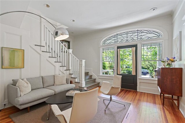 foyer with stairs and light wood-type flooring