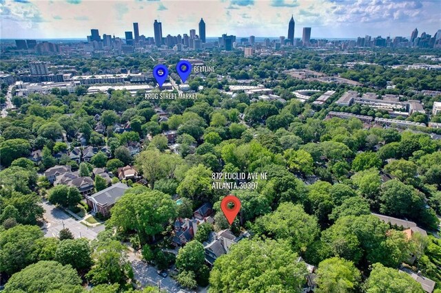 drone / aerial view with a view of city