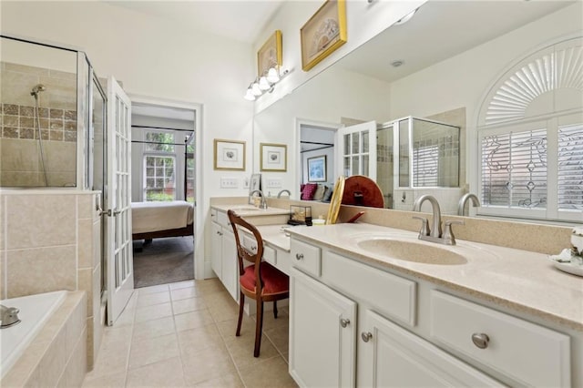 6259 Spalding Dr, Peachtree Corners, GA 30092 - full bathroom featuring a shower stall, tile patterned floors, double vanity, french doors, and a relaxing tiled tub