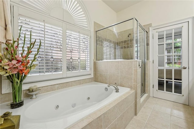6259 Spalding Dr, Peachtree Corners, GA 30092 - bathroom with a stall shower, tile patterned flooring, a jetted tub, and plenty of natural light