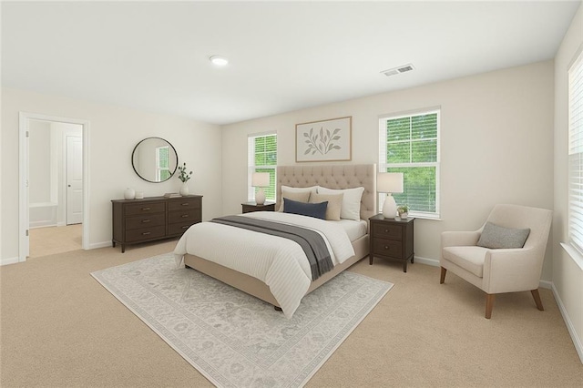 bedroom with light carpet, baseboards, and visible vents