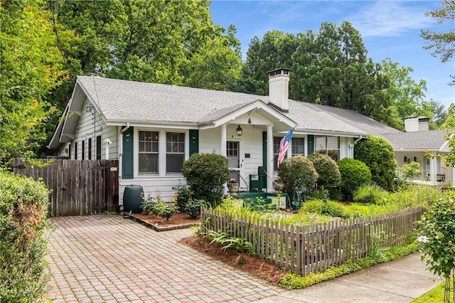 4 Arc Way NE, Atlanta, GA 30305 - view of front of home with a chimney and a shingled roof
