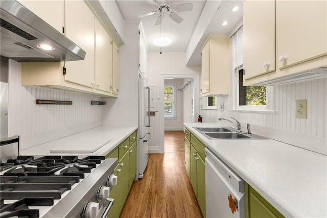 4 Arc Way NE, Atlanta, GA 30305 - kitchen featuring exhaust hood, white dishwasher, green cabinetry, and a sink