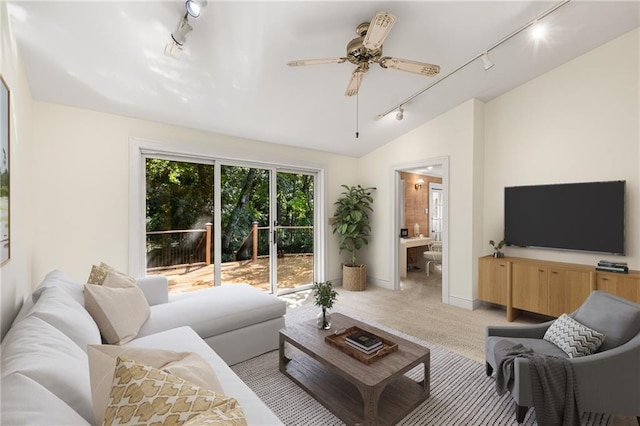 4 Arc Way NE, Atlanta, GA 30305 - living room featuring rail lighting, lofted ceiling, light colored carpet, ceiling fan, and baseboards