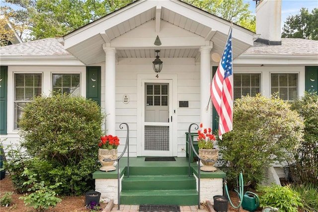 4 Arc Way NE, Atlanta, GA 30305 - entrance to property featuring a chimney and roof with shingles