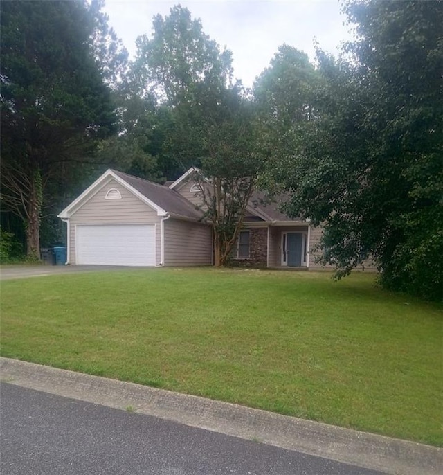 2868 Evonshire Ln, Dacula, GA 30019 - view of front facade featuring an attached garage, a front lawn, and driveway