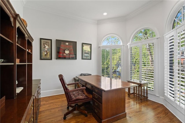 home office featuring ornamental molding, dark wood-type flooring, baseboards, and recessed lighting