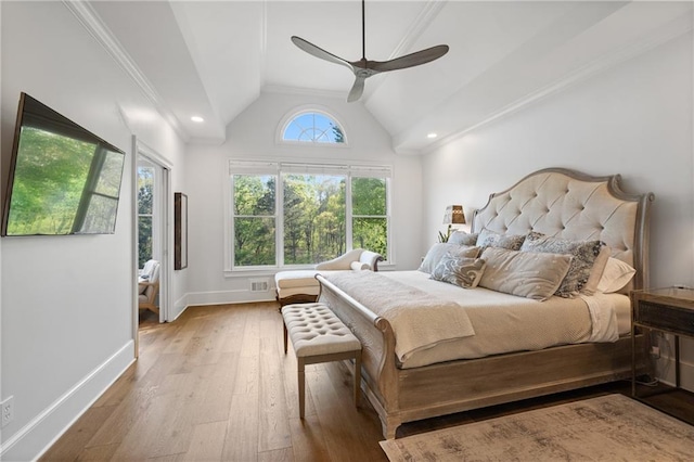 bedroom featuring vaulted ceiling, hardwood / wood-style flooring, baseboards, and a ceiling fan