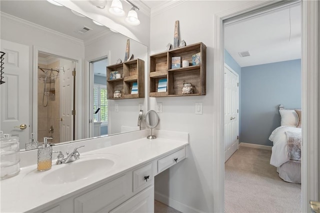 full bathroom with vanity, a shower, crown molding, and baseboards