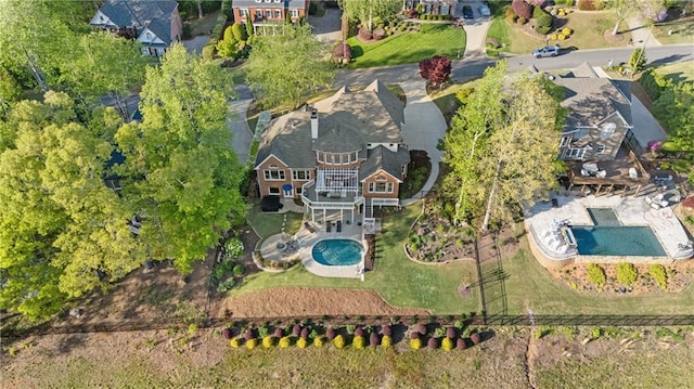 aerial overview of property's location with a pool