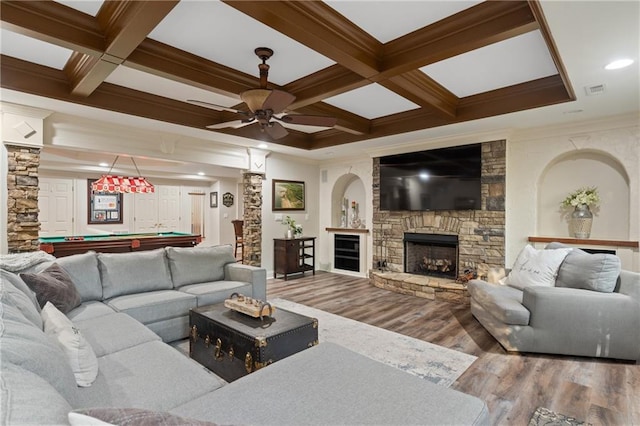 living area with wood finished floors, a ceiling fan, pool table, a fireplace, and beamed ceiling