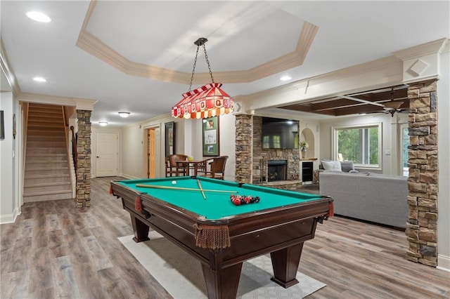 rec room featuring a fireplace, crown molding, wood finished floors, billiards table, and recessed lighting