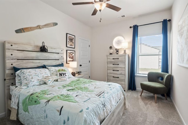 bedroom featuring carpet flooring, ceiling fan, baseboards, and visible vents