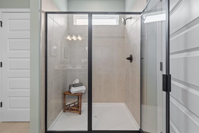 bathroom featuring a stall shower