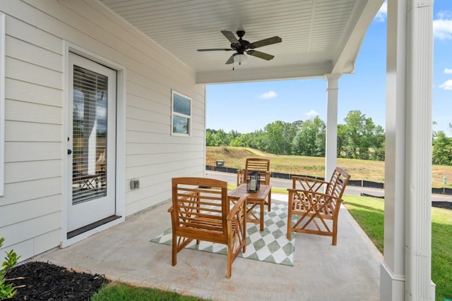 view of patio / terrace featuring a ceiling fan and an outdoor hangout area