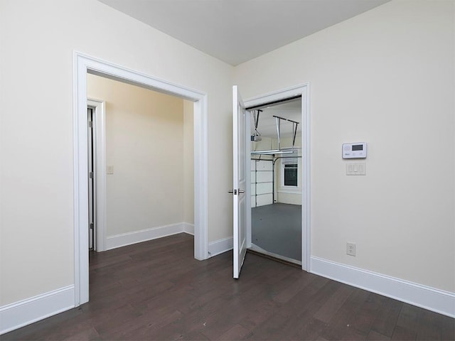 interior space with dark hardwood / wood-style floors