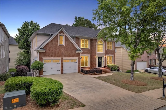 2810 Olde Town Park Dr, Norcross, GA 30071 - traditional-style home with brick siding, central air condition unit, driveway, and an attached garage