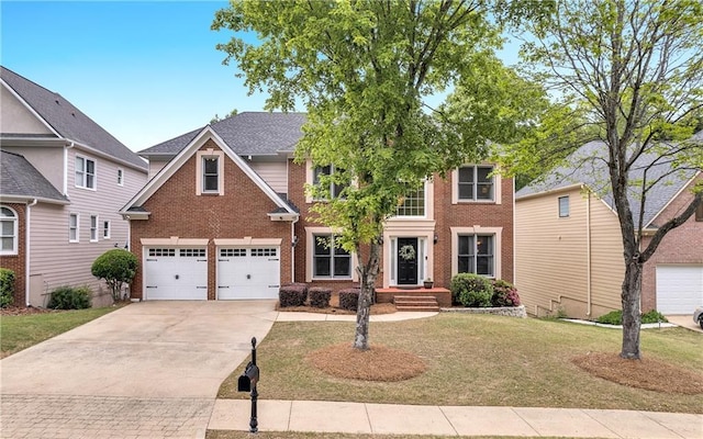 2810 Olde Town Park Dr, Norcross, GA 30071 - view of front facade with a garage, brick siding, a front yard, and concrete driveway